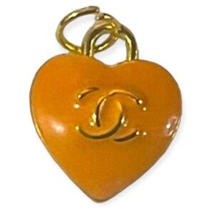 Chanel CC Orange charm on black rope necklace